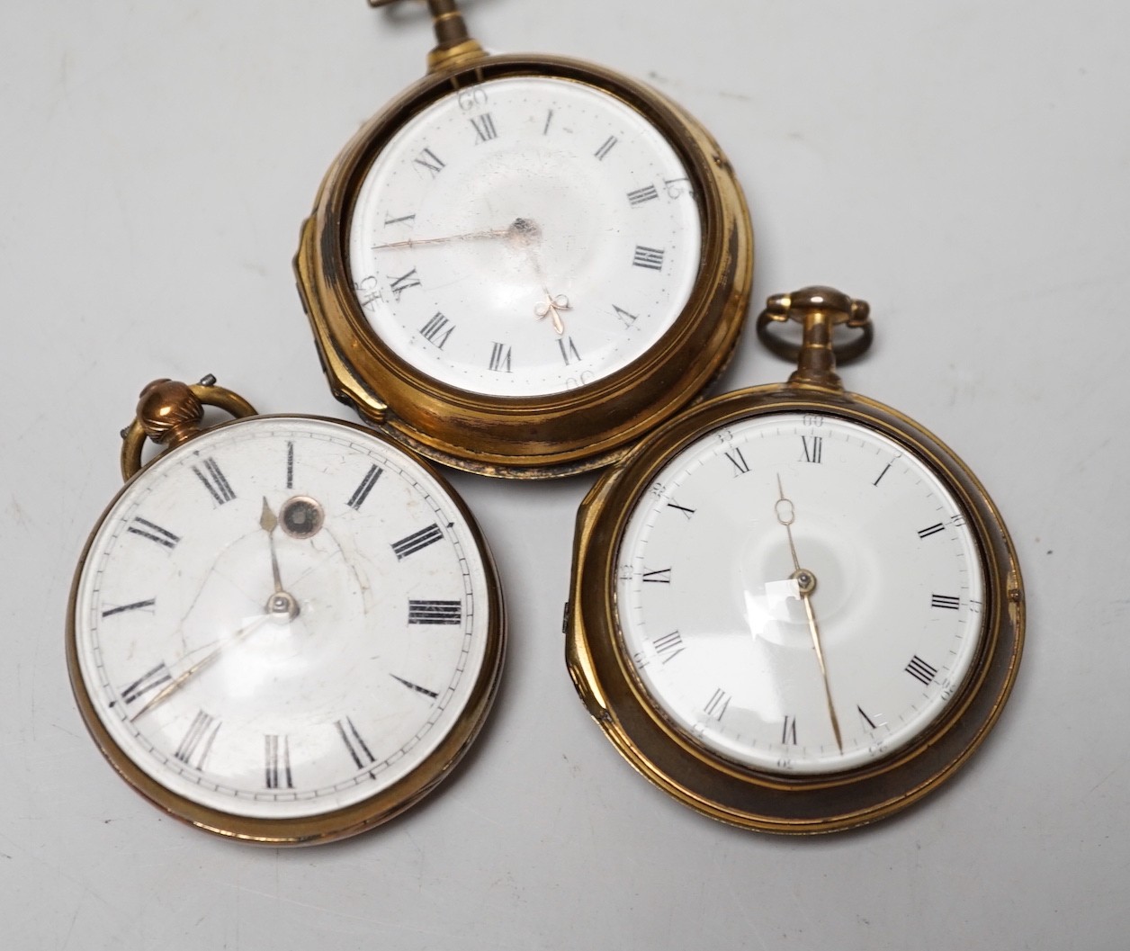 Two 18th century gilt metal pair cased keywind verge pocket watches, by J. Marriott, London and J. Watson, London, together with a 19th century gilt metal open faced verge pocket watch by T. Rowell, Brighton.